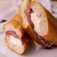 Salame Baguette · Rosette Salame with brie cheese on a sweet baguette