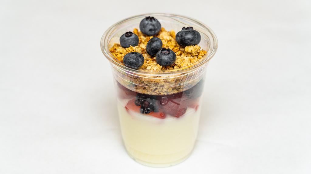 Zanotto's Yogurt Parfait · Your choice of vanilla or strawberry yogurt, topped with layers of fresh strawberries, rapberries, blackberries, granola, and blueberries
