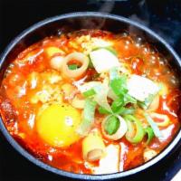 Kimchi Tofu Soup · Soft tofu soup with Kimchi and pork
