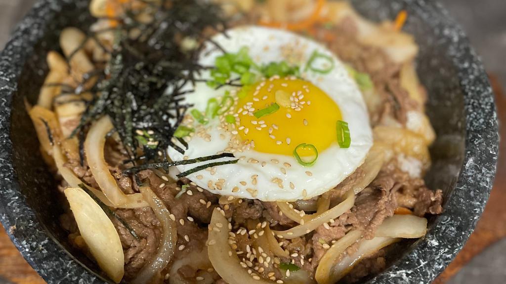 Hot-stone Beef bulgogi Dipbap · Korean marinated beef and mixed veggie over rice