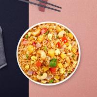 Palm Spring Pineapple Fried Rice · Combination fried rice of prawns and chicken with fresh pineapple, cashew nuts, raisins, car...