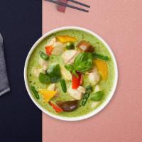 Everything's Gone Green Curry · Green curry with eggplant, green peas, bell peppers, and basil cooked in coconut milk.
