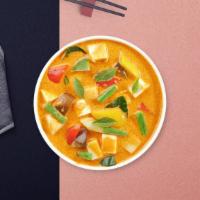 Yellow Tofu Magma · Yellow curry with tofu, potatoes, carrots, and onions cooked in coconut milk.