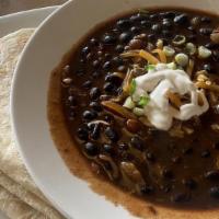 Black Bean Chili · Award winning veggie chili with cheddar, sour cream & green onion.