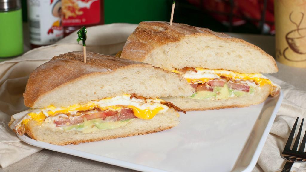 $ Breakfast Sandwich · Served with choice of meat (Bacon ,Sausage,turkey,hot link or  ham )with eggs, avocado, tomato, cheese on ciabatta bread.