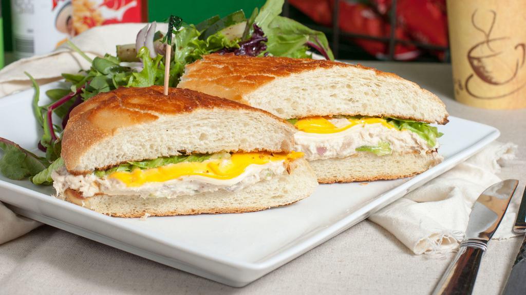 Tuna Melt Sandwich · Albacore tuna with red onion celery lemon mayo with melted cheddar  served with Your choice of bread  Ciabatta or Dutch crunch