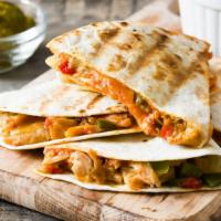 Chicken Quesadilla · Perfectly grilled flour tortilla filled with farm fresh chicken and Jack and Cheddar cheeses...