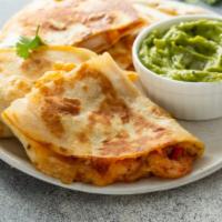 Shrimp Quesadilla · Warm, flour tortilla filled with delectable shrimp and Jack and Cheddar cheeses. Served with...