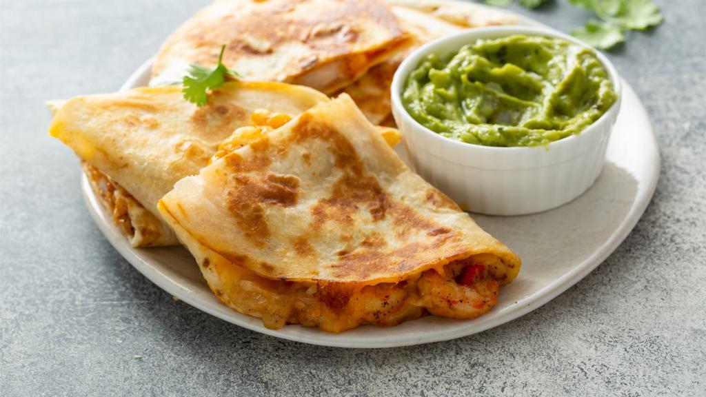 Shrimp Quesadilla · Warm, flour tortilla filled with delectable shrimp and Jack and Cheddar cheeses. Served with tasty salsa, fresh guacamole and delicious sour cream.