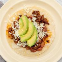 Super Taco · Meat, beans, cheese, avocado.