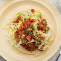 Fish Taco · Soft tortilla, lettuce, meat & de Gallo.
