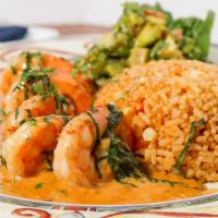 Cabo Prawns · Sautéed prawns served in a creamy chipotle-tequila sauce, rice and grilled corn-avocado salsa.