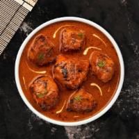 Chicken Tikka Masala · Barbecued boneless chicken cooked in famous creamy sauce.