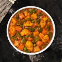 Vegetable Korma · Mixed vegetables cooked with onions, tomatoes and aromatic spices in creamy curry.