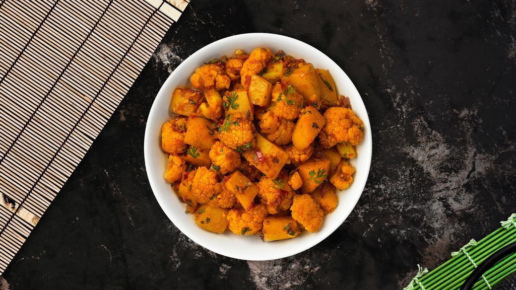 Aloo Ghobi · Idaho potatoes and fresh cauliflower cooked with spices and herbs.