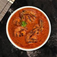 Prawn Tikka Masala · Prawns cooked in creamy tomato curry sauce.