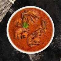 Prawn Vindaloo · Prawns and potatoes cooked in spicy curry.
