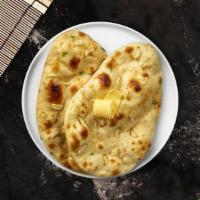 Chilli Naan · Freshly baked bread stuffed with fresh chilli.