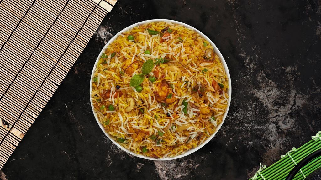 Vegetarian Biryani · Spiced seasoned vegetables cooked with Indian spices and basmati rice.