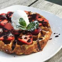Strawberry & Chocolate Waffle · Fresh strawberries, fresh whipped cream, Guittard chocolate sauce, powdered sugar
