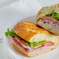 5. The Mobster · Ham, salami, prosciutto, provolone, lettuce, tomatoes, mayonnaise and red wine vinaigrette.