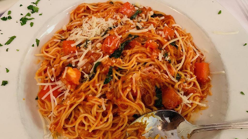 Cappellini alla Cecca Pasta · Fresh diced tomatoes, garlic, basil.