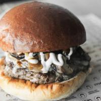 IMPOSSIBLE Truffle Baga · Eat the IMPOSSIBLE with the 100% plant based IMPOSSIBLE Burger. Topped with umami glaze, tru...