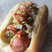 Manhattan Pride · Homage to New York's finest! 100% Angus beef dog topped with  sweet relish, diced onions, di...