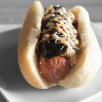 Tokyo Signature · 100% Angus beef dog topped with caramelized onions, roasted seaweed, teri-mayo sauce, Umai t...