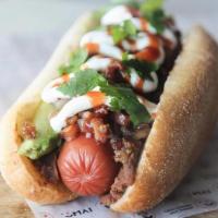 Dirty Dog · 100% Angus Beef topped with bacon, caramelized onions, pico de gallo, Tapatio ketchup, mayo,...