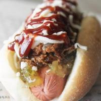 Nashville Brisket · Turkey dog topped with pulled pork brisket, pepper jack cheese, house bbq sauce and relish o...