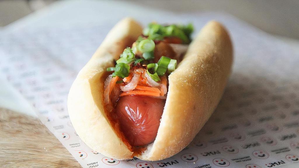 Thai Thunder · Spicy level one. Turkey dog topped with sweet chili sauce, sriracha sauce pickled daikon radish & carrots, green onions, peanut sauce and red chili flakes on a brioche bun.