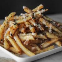 Umai House Fries · Crispy fries topped with Umai teriyaki sauce, dynamite sauce and nori flakes.