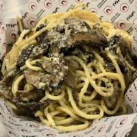 Truffle Noodles · Noodles tossed with Butter, Truﬄe Aioli, and Parmesan Cheese & Truﬄed Mushrooms and topped w...