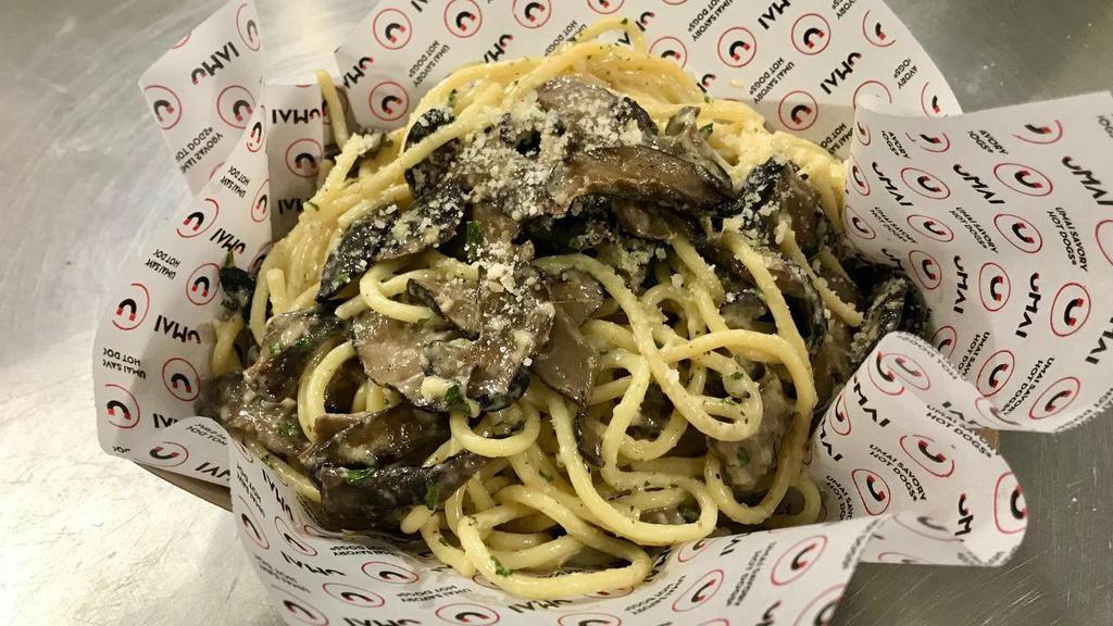Truffle Noodles · Noodles tossed with Butter, Truﬄe Aioli, and Parmesan Cheese & Truﬄed Mushrooms and topped with more Parmesan Cheese.