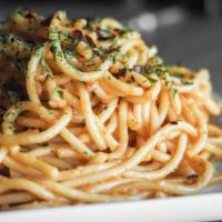 Spicy Garlic Noodles · Noodles tossed in garlic butter, fresh garlic, parsley and chili sauce. Medium spicy.