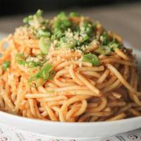 Spicy Thai Peanut Curry Noodles · Noodles tossed in our curry peanut sauce. Medium spicy.