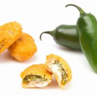 Jalapeno Poppers · Spicy jalapeno poppers stuffed melted cream cheese.