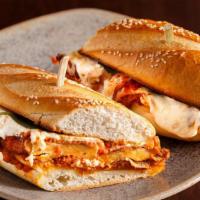 Chicken Parmigiana Sandwich · White meat chicken, house-made marinara sauce, and parmesan cheese stuffed in between fresh ...