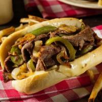 American Philly Cheese Steak · Tender beef, mushrooms, onions, bell peppers, and cheese stuffed in between fresh made bread.