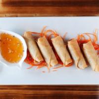 Crispy Vegetarian Rolls · Vegetarian spring roll served with plum sauce and ground peanuts.