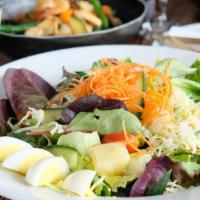 House Salad · Roman lettuces, iceberg lettuces, mixed spring salad, sliced cabbages, carrots, tomatoes, pi...