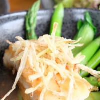 Lemongrass Sea Bass · Baked sea bass, steamed organic baby bok choy, asparagus with lemongrass sauce and garnished...