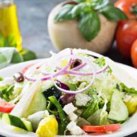 House Salad · Spring mix, tomatoes, red onions, mushrooms with homemade balsamic vinaigrette.