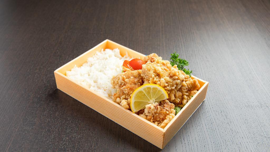 Chicken Karaage · Japanese style deep fried chicken served with rice and vegetables