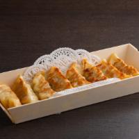 Pan Fried Potstickers · House made pork potsticker pan fried to perfection