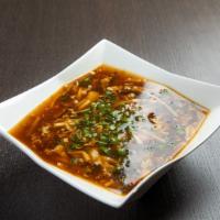 Hot and Sour Soup · Rich broth with tofu, egg, and bamboo shoots