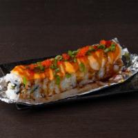 Lion King · Real crab ca roll with salmon on top and baked with house special sauce.