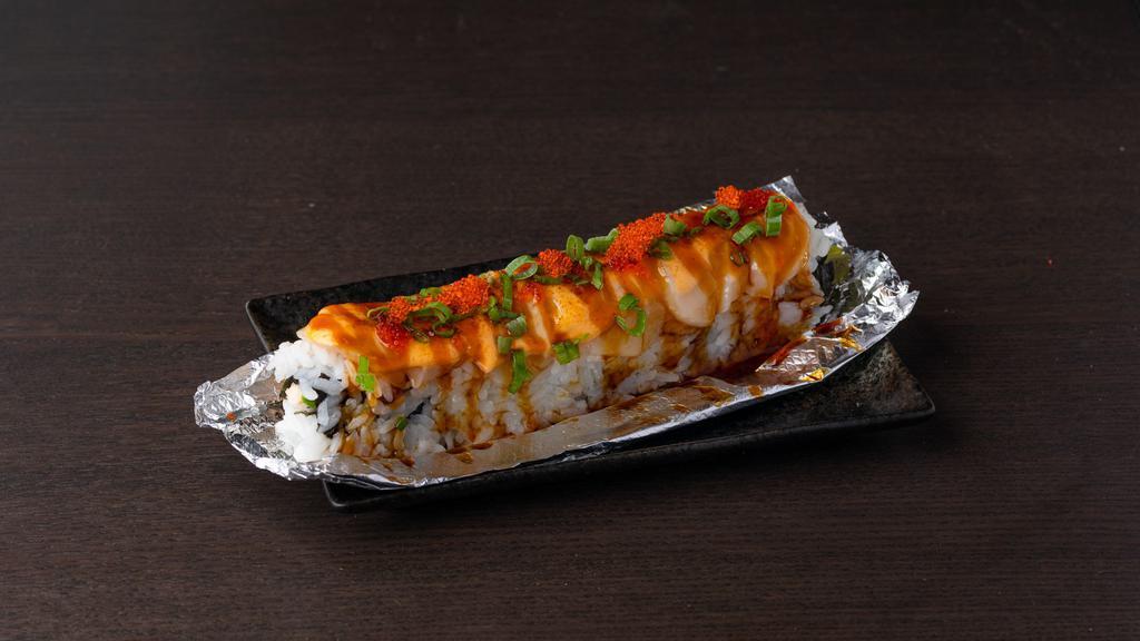 Lion King · Real crab ca roll with salmon on top and baked with house special sauce.