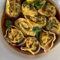 2. Sichuan Chili Shallot Pork Wontons (10 pcs) · Ground pork, mustard greens, dressed in a soy vinegar chili sauce, topped with Sichuan Chili...